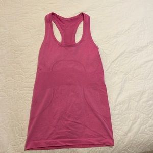 Pink lulu lemon work out top. Size 4